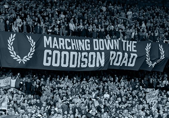 Supporters in a football stadium